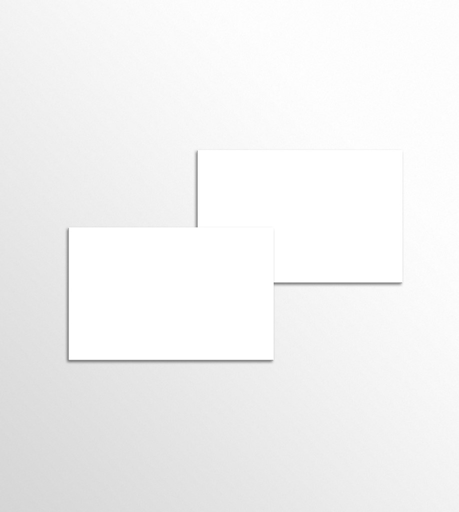 Minimal business card mockup on a clean work surface.